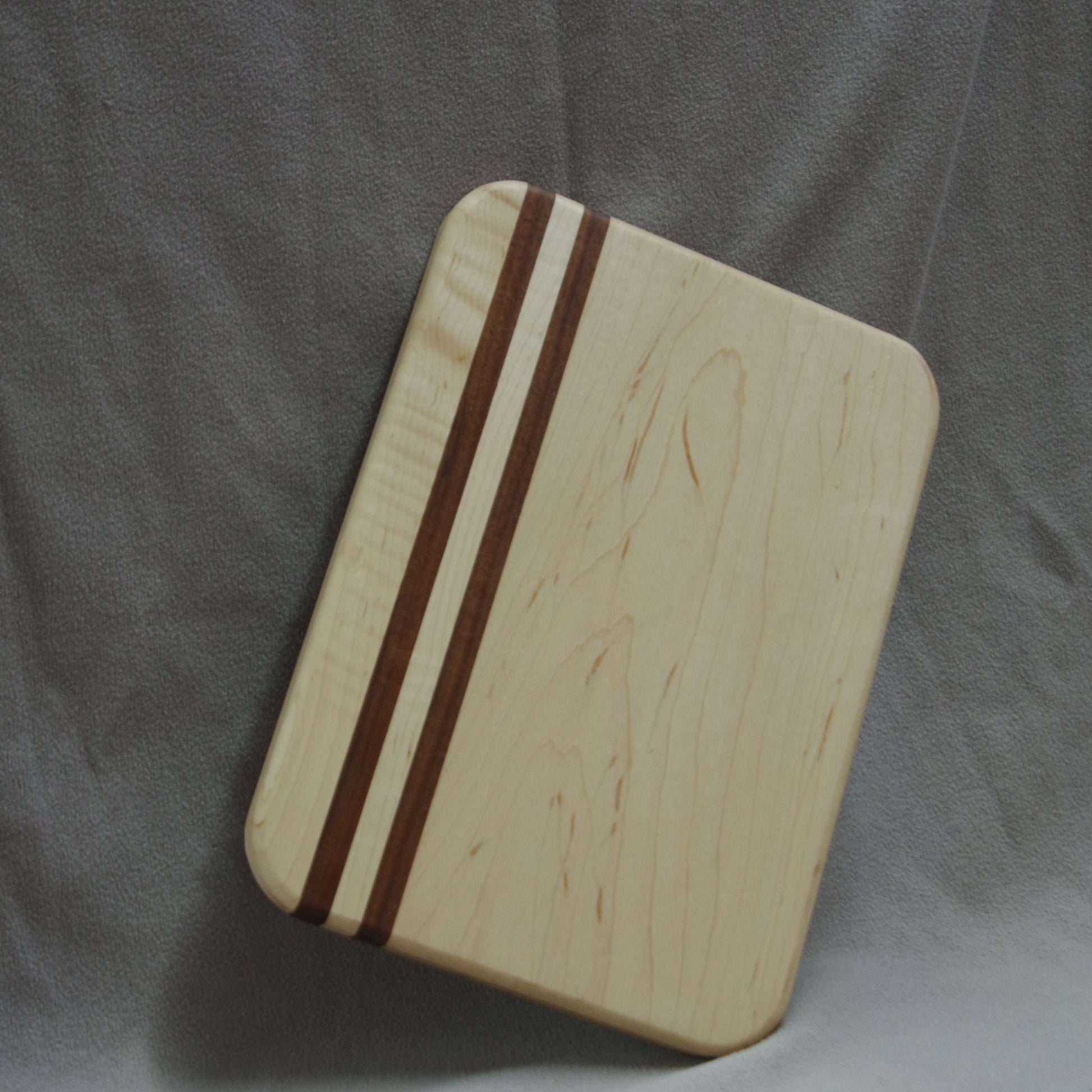 Maple cutting board with walnut accents.
